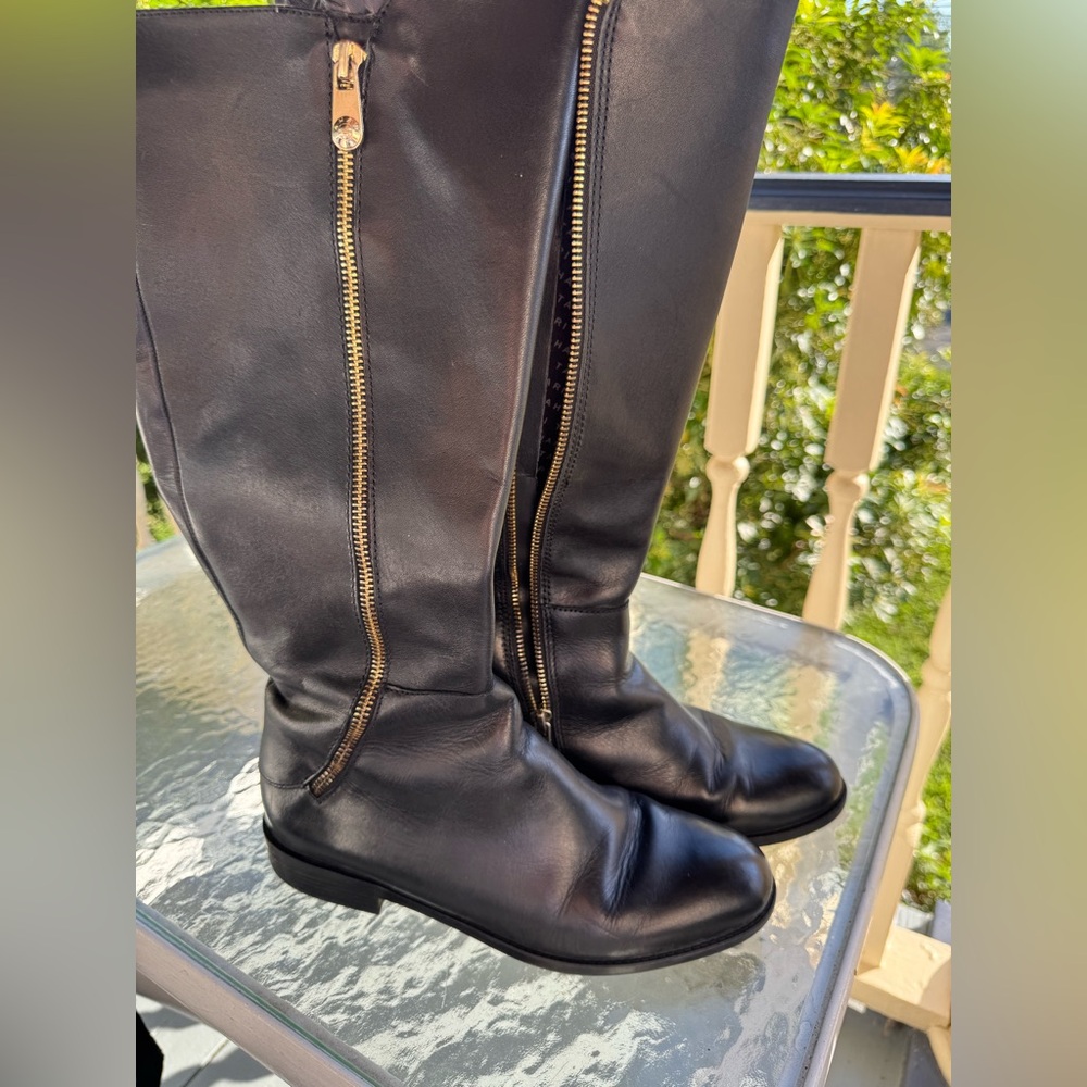 Tahari leather zip boots.
